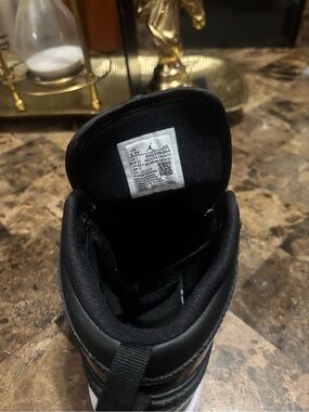 Nike Black and White Mid-Top Sneaker with Padded Collar